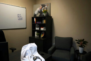 Counseling office with an armchair and encouraging whiteboard for trauma-focused therapy