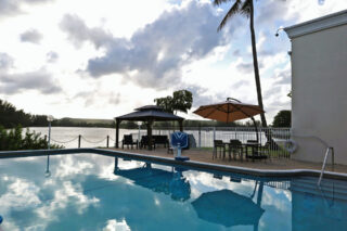 Lakeside pool deck at Crystal Lake Healing, a center for opioid addiction treatment in Florida